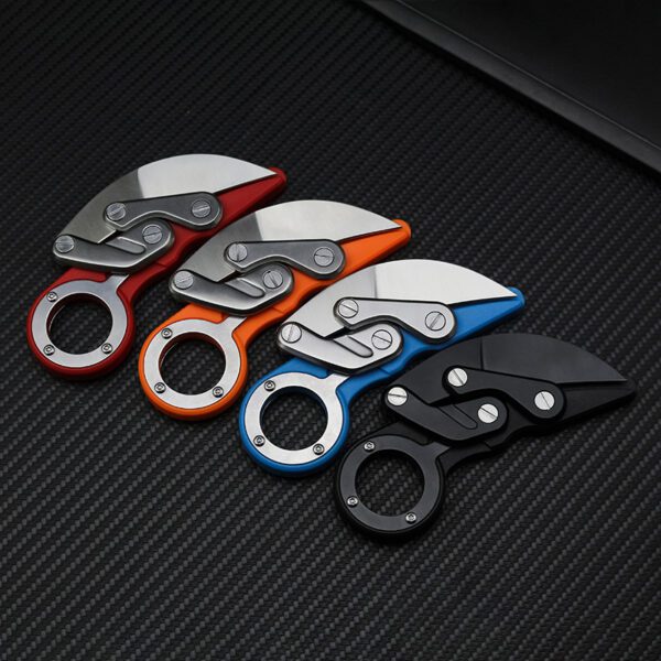 The Gripper's Edge™ Mechanical Claw Knife – Your Compact Powerhouse